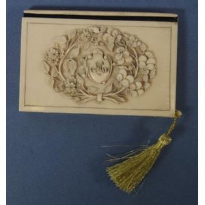 Antique ivory notebook, embossed floral decoration, with…
