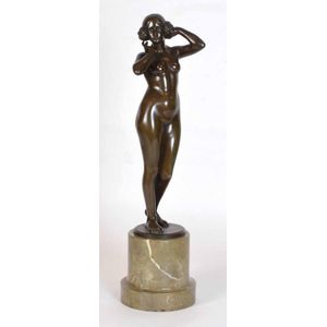 An Art Nouveau bronze figure of a nude maiden, c.1910. Maker…
