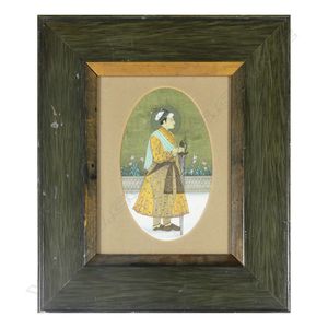 A 19th century Indian miniature of a Mughal prince, standing…