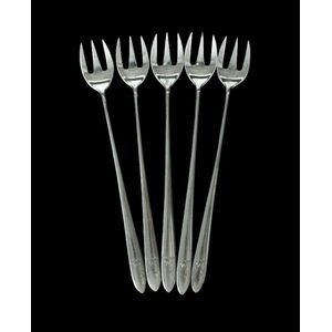 Five Tiffany & Co. Faneuil pattern cocktail forks. Each with…