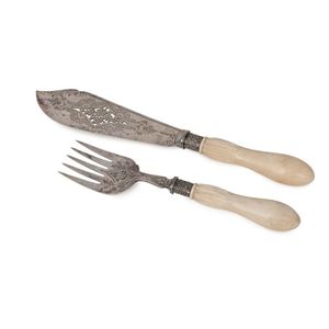 A pair of silver plated fish servers with finely carved ivory…