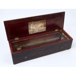 An antique Swiss music box in timber case, single barrel with…