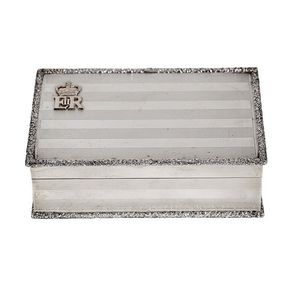 A Queen Elizabeth II Royal presentation silver and gold…