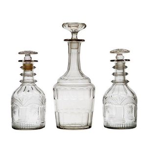 A pair of George III decanters together with an unusually large…