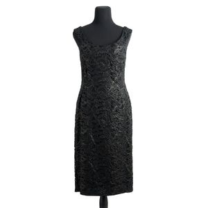 Gucci, cocktail dress; styled in black rayon-cotton blend with&hellip;
