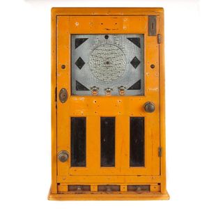 An orange painted wooden case skill ball arcade machine, custom…