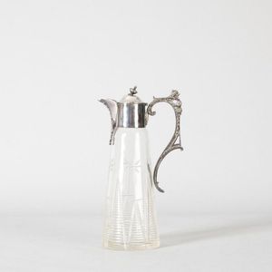 A cut crystal and silver plate claret jug, note damage to lid,…
