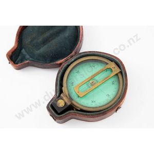 Victorian bronzed brass prismatic pocket barometer, the green…