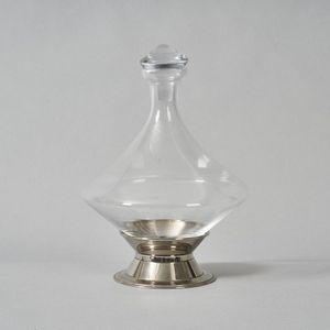 A ships decanter, spinning top form with silverplate cradle,…