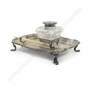 An Edwardian silver inkstand of Georgian style, the oblong tray…