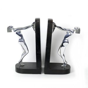 A pair of Art Deco bookends, the ebonised wood stands each with…