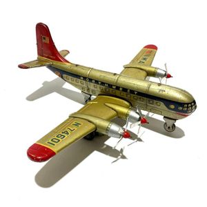 A tin plate friction powered litho four propeller passenger…