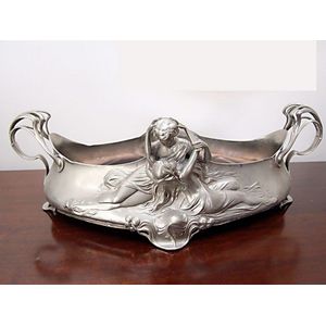Art Nouveau WMF plated jardiniere of oval form cast with draped…