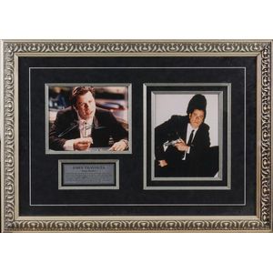 A John Travolta signed and framed photograph, framed 58 x 80.5…