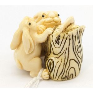 Carved Japanese ivory netsuke, carved netsuke depicting two… - Netsuke ...