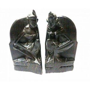 Pair of carved hardwood figural bookends Indonesian, male and…