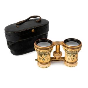 A pair of tortoiseshell and ivory opera glasses, French 19th…