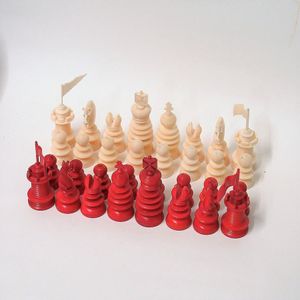 A quality vintage ivory chess set, 32 piece, red stained and…