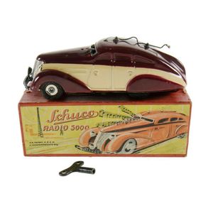 Schuco radio 5000 clockwork car. Saloon car in red & cream,…