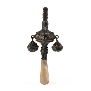 A silver baby rattle with shell handle, 19th century, 8 cm high