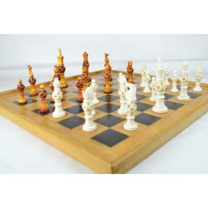 Chinese ivory chess set with gold embossed leather top 20th…
