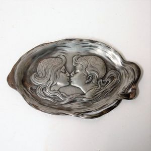 An Art Nouveau WMF silver plate tray, relief decorated with a…