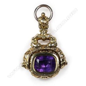 A fancy Victorian 15ct gold and amethyst fob spinner, relief&hellip;
