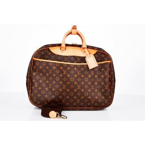 LOUIS VUITTON. Travel bag Alizé in Monogram coated can…