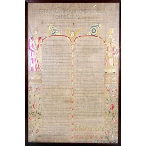 A fine antique sampler in French, the Ten Commandments, circa…