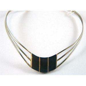 A sterling silver three strand necklet inset with onyx…