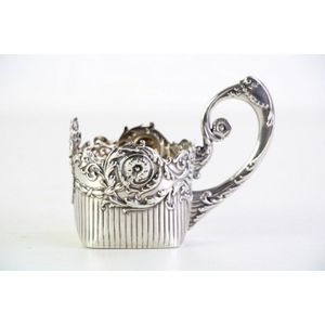 A 19th century Russian silver tea glass holder marked St…