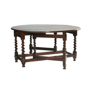 A Jacobean oak dropleaf dining table; late 17th century, the…