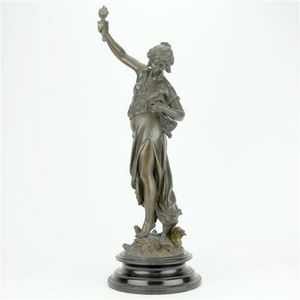 Art Nouveau bronze figure of a lady holding a torch & dove with…