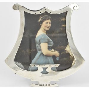 A sterling silver lyre shaped photo frame, Lawrence Emanuel,…