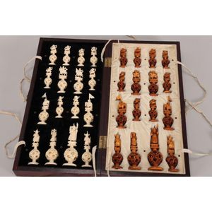 Chinese carved ivory chess set, each piece carved with sword…