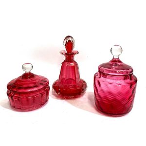 Two Victorian cranberry glass lidded dishes & a matching…