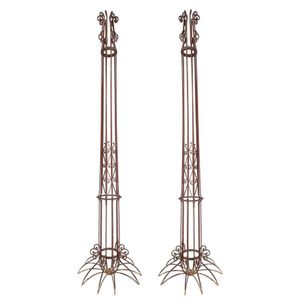 A pair of exceptional cast iron trellis trainers, French, circa…