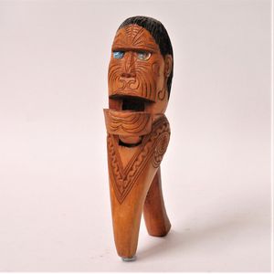A mid-20th century New Zealand Maori carved nutcracker, formed…