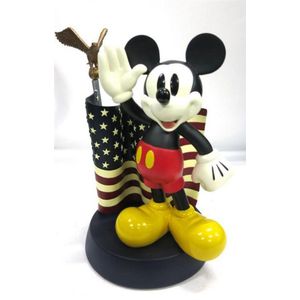 A Disney figure of Mickey mouse and the USA flag by Costa…
