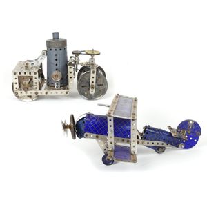 Two c.1930 Meccano constructed toys, a bi-plane with hatch blue…