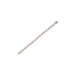 A Diamond Bracelet, Circa 1965, composed of openwork links set…
