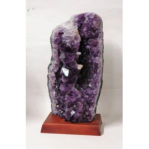 A large and impressive part amethyst geode, the tall section…