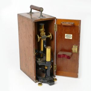 A Victorian brass and ebonised metal monocular microscope, by W.…
