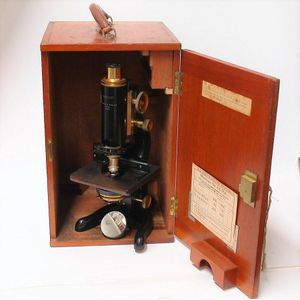 A 1930 W. Watson & Sons, London Service' brass and black…