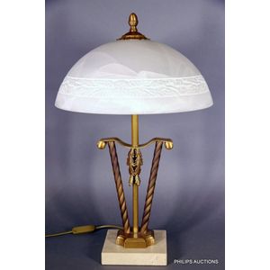 A modern brass and alabaster lamp, with a mushroom style white…