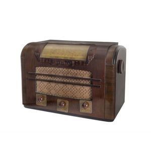 A Radiola walnut and Bakelite mantle radio, mid 20th century,…