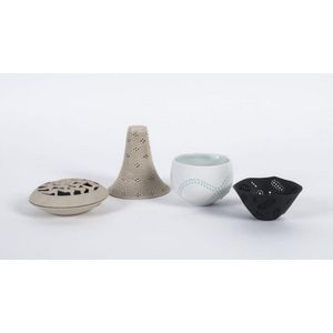 Sandra Black Two pierced ceramic vases, a cream jug and a jewel…