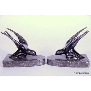 A pair of Art Deco spelter swallow bookends, circa 1930, pewter…