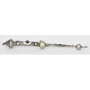 A silver torah yad, with Art Nouveau design, inset with a…