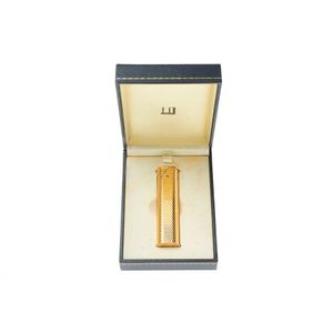A Dunhill lighter, reeded design, Pat. No. 3910750, 7 x 1.5 cm,…